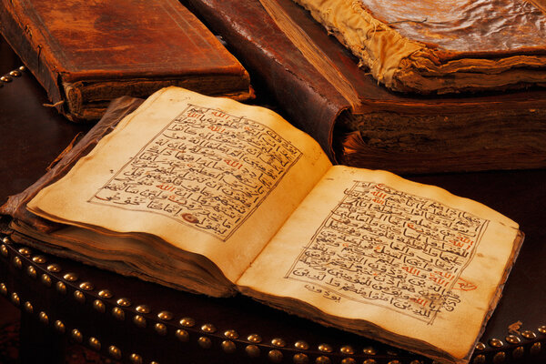 An ancient hand scripted Quran Stock Photo
