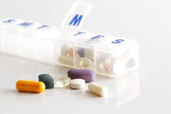 A weekly container of tablets, vitamins etc — Stock Photo, Image