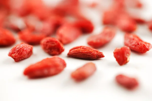 Organic pomegranate seed berries against a white background — Stock Photo, Image