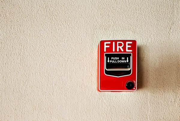 Fire alarm button on a wall — Stock Photo, Image