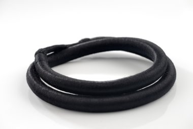 The agal is a black doubled cord, worn on head usually by Arab men clipart