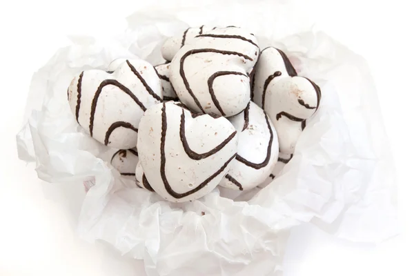 Cookies in the form of hearts with white and dark chocolate — Stock Photo, Image