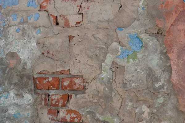 Ruinierte Mauer mit Mauerwerk — Stockfoto