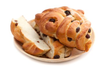 pan dulce con pasas sobre un fondo blanco