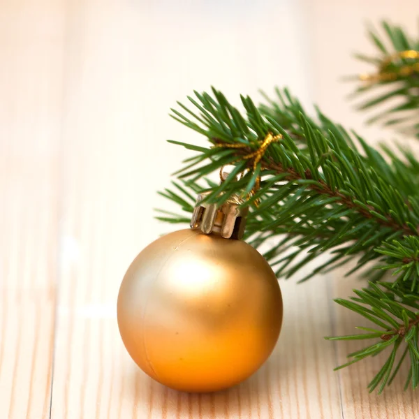 Orange ball on the Christmas tree — Stock Photo, Image