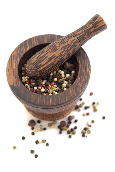 Mortar and pestle with peppercorn mix on white background — Stock Photo, Image