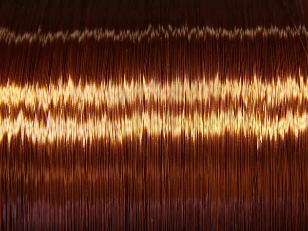 O fio esmaltado de cobre na bobina . Fotos De Bancos De Imagens Sem Royalties