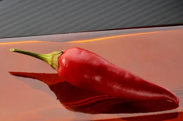 Czerwony chili na czerwone szkła — Zdjęcie stockowe