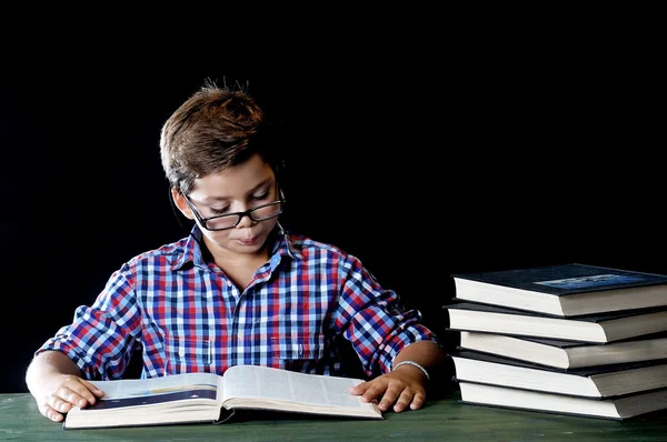 Young student reading a book — Stock Photo, Image