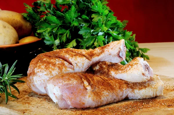 Chicken thighs with parsley — Stock Photo, Image