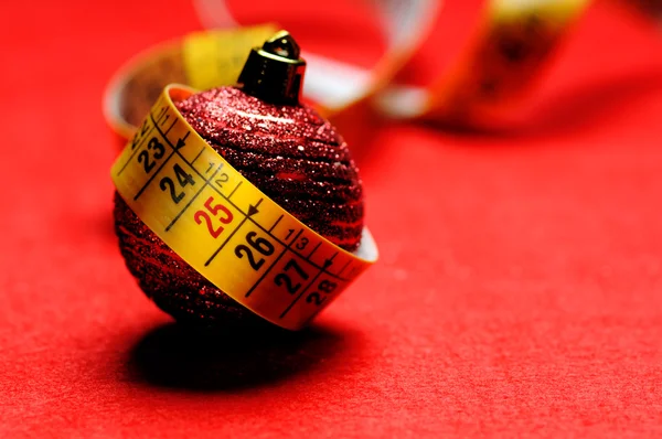 Christmas ball with red date-stamp — Stock Photo, Image