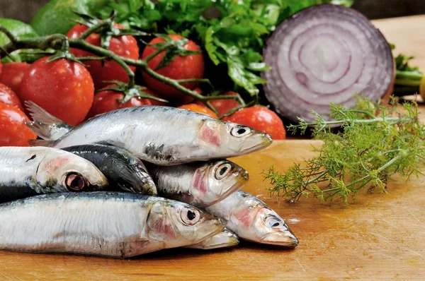 Eels op een houten snijplank — Stockfoto