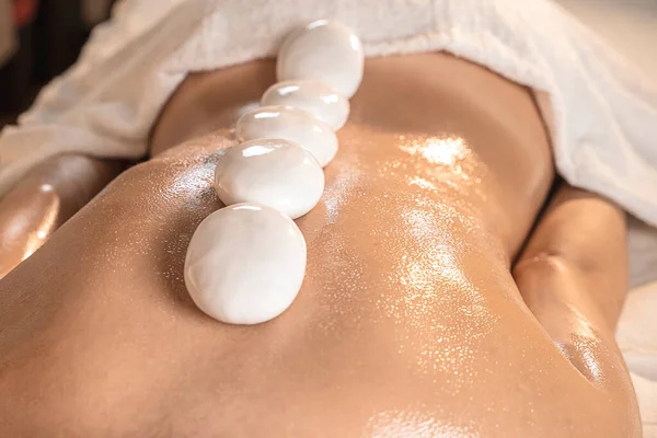 Wellness Center Young Woman Satisfied Relaxing Massage Mineral Stone — Foto Stock