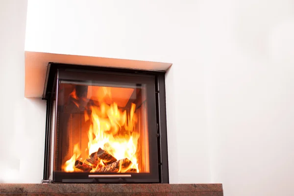 Heating small fireplace — Stock Photo, Image