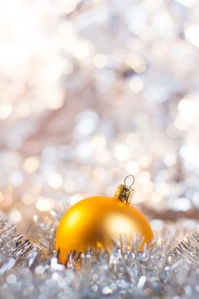 Christmas ball on abstract light background — Stock Photo, Image