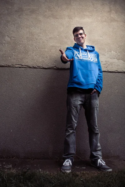 Street portrait of young boy in blue sweatshirt with modern eyeg — Stock Photo, Image