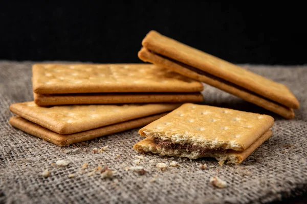 Cracker Sandwiches Chocolate Filling Black Background — Stock Photo, Image