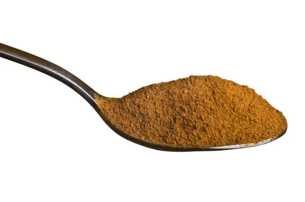 Cinnamon in a spoon — Stok fotoğraf