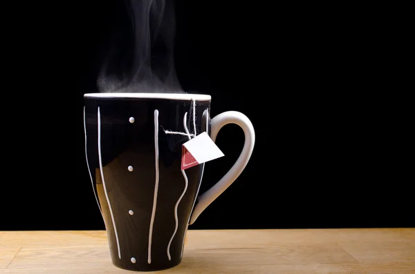 Steaming hot cup of tea — Stock Photo, Image