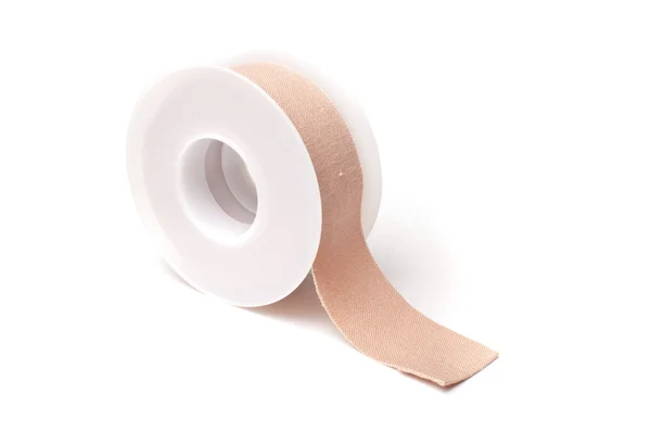 Adhesive patch on roll — Stock Photo, Image