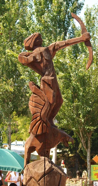 Wooden sculpture Sagittarius — Stock Photo, Image