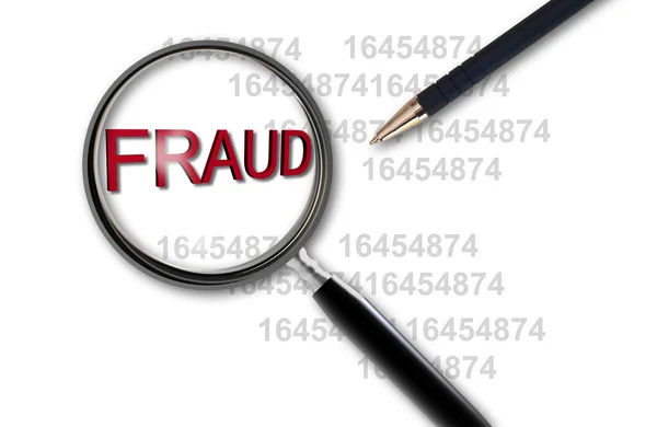 Fechar a lupa sobre a fraude — Fotografia de Stock