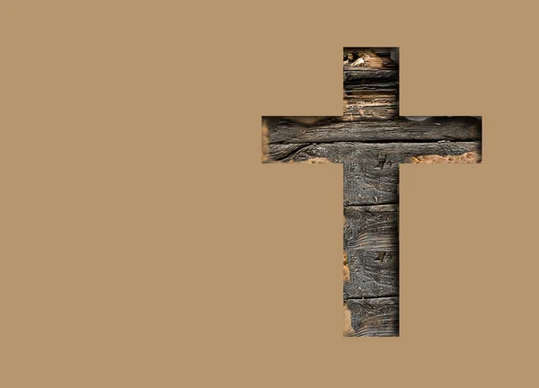 Крест под стеной — стоковое фото