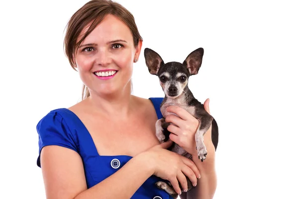 Portrait of a young woman holding her chihuahua dog — Stock Photo, Image