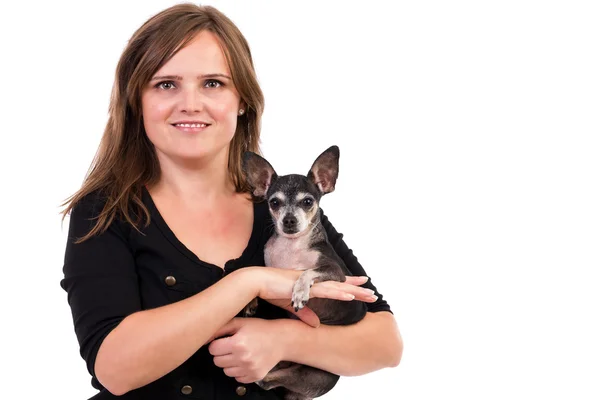 Portrait of a young woman holding her pet dog. — Stock Photo, Image