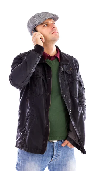 Portrait of handsome young man talking on the phone and looking — Stock Photo, Image