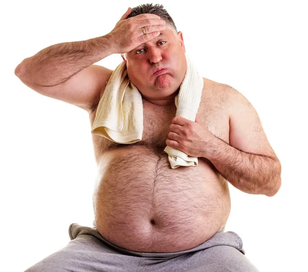 Overweight man resting, tired after training, with hand on foreh — Stock Photo, Image