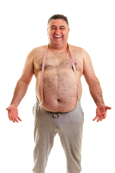 Happy fat man with a tape measure around his neck — Stock Photo, Image