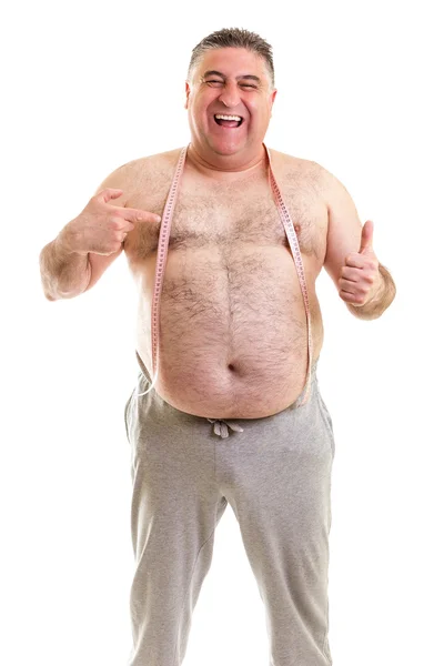Happy fat man with a tape measure around his neck Royalty Free Stock Photos