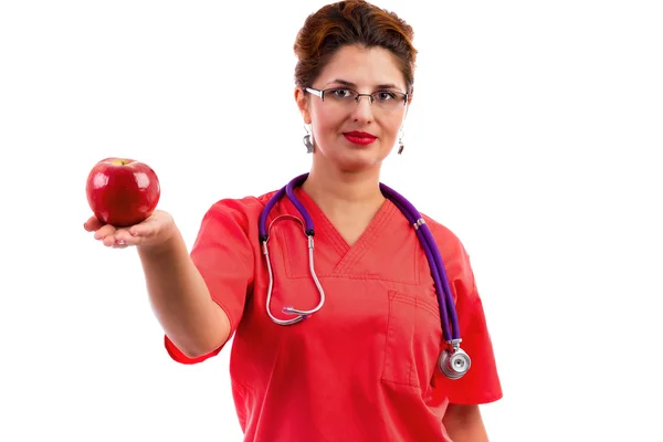 Portrait of a female doctor or nurse with stethoscope holding an — Stock Photo, Image