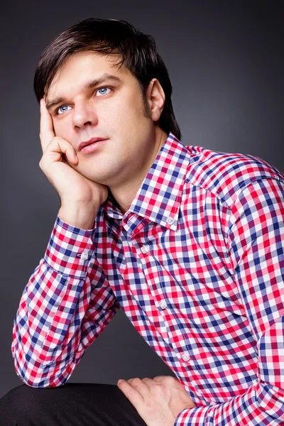 Closeup portrait of a young man thinking about a problem — Stock Photo, Image