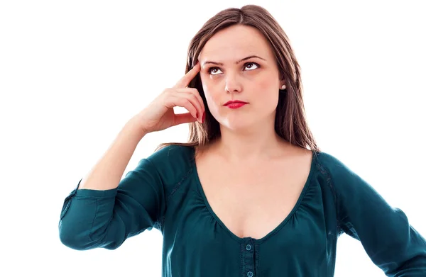 Portrait of a pretty young woman thinking at something — Stock Photo, Image