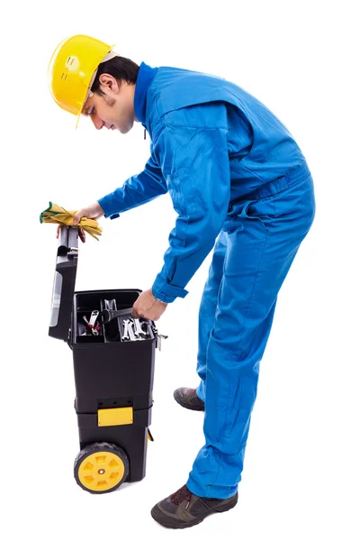 Young constuction worker looking through his toolbox — Stock Photo, Image