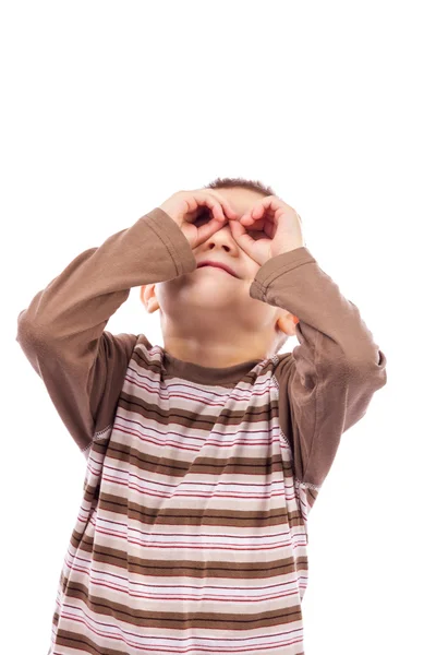 Gyártás képzeletbeli binokuláris kezével aranyos kisfiú — Stock Fotó