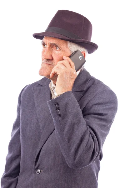 Retrato de um sênior expressivo falando por telefone — Fotografia de Stock