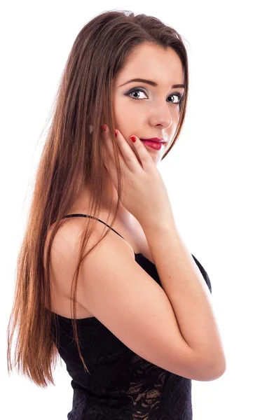 Mooie vrouw met lang bruin haar hand houden op gezicht — Stockfoto