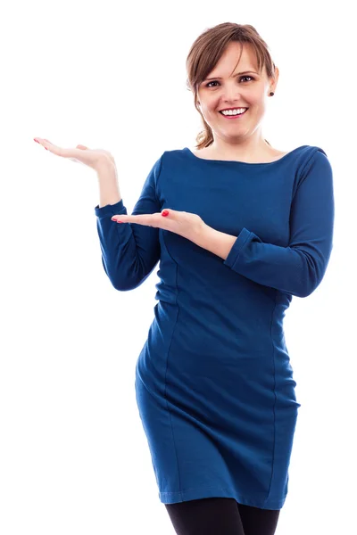 Pretty young woman presenting something — Stock Photo, Image