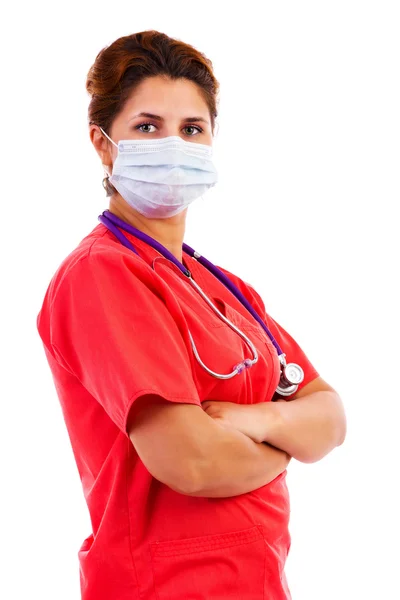 Young female doctor with mask and stethoscope Royalty Free Stock Photos