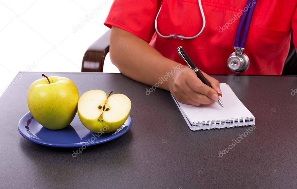 Doctor writting a prescription