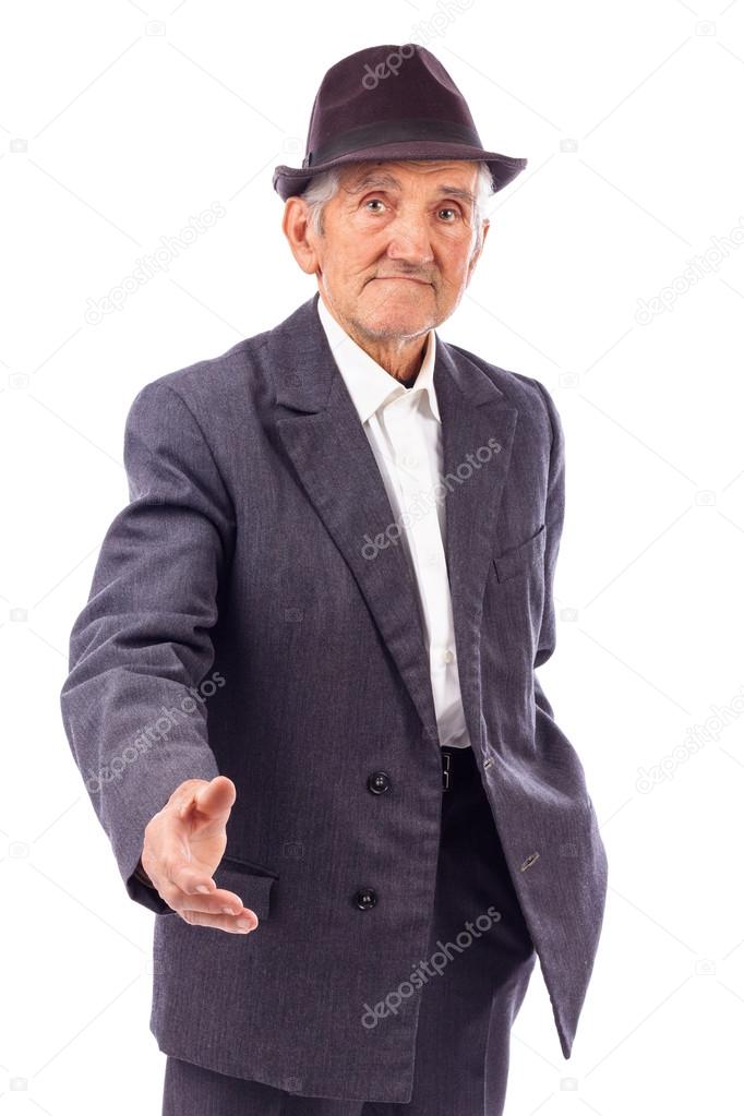 Senior man with hand outstretched for a handshake