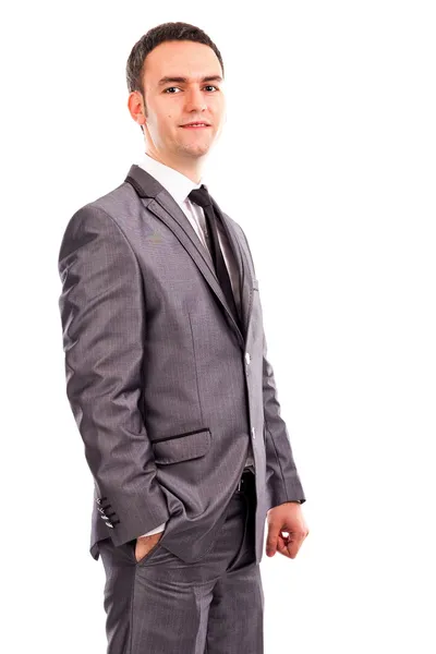 Porträt eines jungen Geschäftsmannes, der mit einer Hand in der Hand steht — Stockfoto