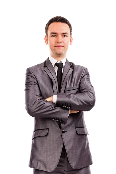Primo piano ritratto di un giovane uomo d'affari con le braccia incrociate — Foto Stock