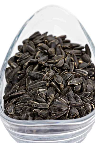 Black sunflower seeds in a bowl — Stock Photo, Image
