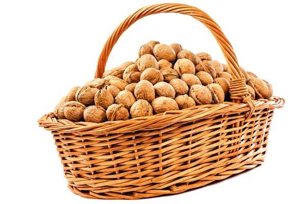 Walnuts in wicker basket — Stock Photo, Image