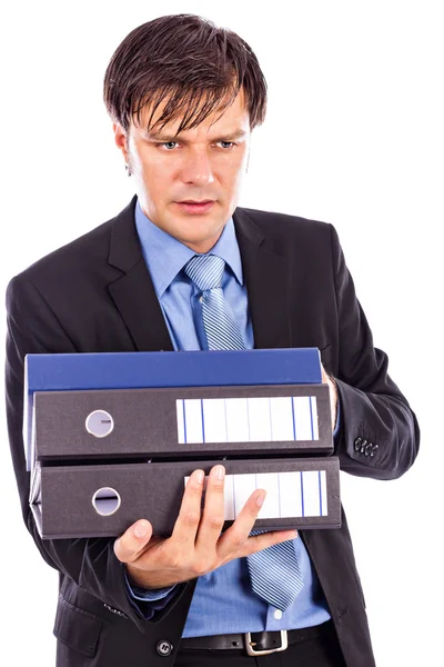 Young businessman holding many folders — Stock Photo, Image