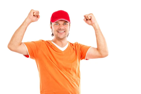 Портрет счастливого молодого человека с поднятыми вверх руками — стоковое фото